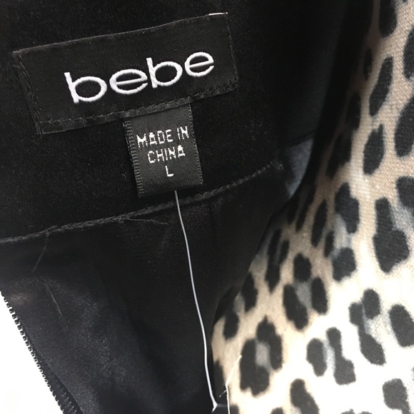 NWT ; Sophisticated, alluring and classic Bebe Sleeveless Deep V-Neck Dress. - Picture 8 of 8